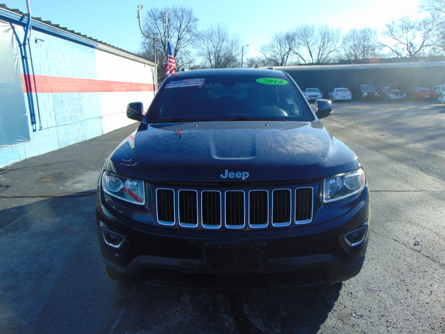 2014 Blue Jeep Grand Cherokee (1C4RJFAG5EC) with an V6 Flex Fuel 3.6 Liter engine, Automatic, 8-Spd transmission, located at 2105 Dixie Hwy, Louisville, KY, 40210, (502) 772-3333, 38.220932, -85.795441 - Photo#4